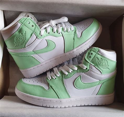 mint green jordan ones